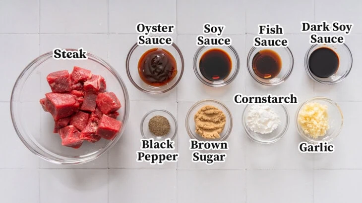 All the ingredients for shaking beef organized and labeled.