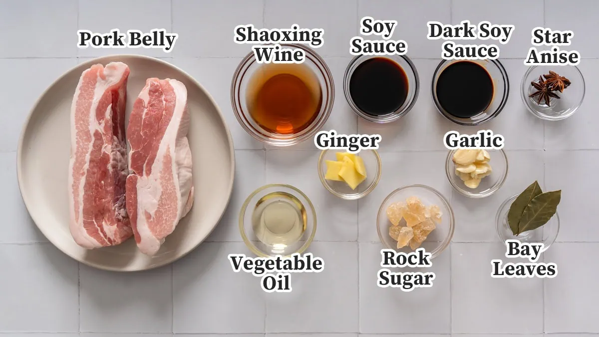 All the ingredients for Chinese braised pork belly organized and labeled.