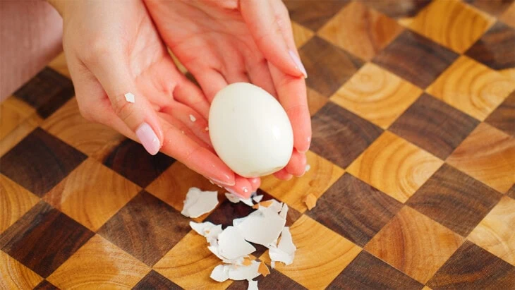 A soft boiled egg after being peeled.