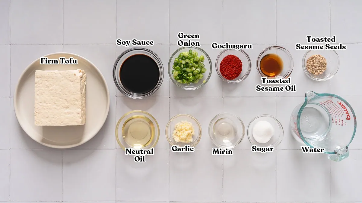 All the ingredients for making Korean braised tofu organized and labeled.