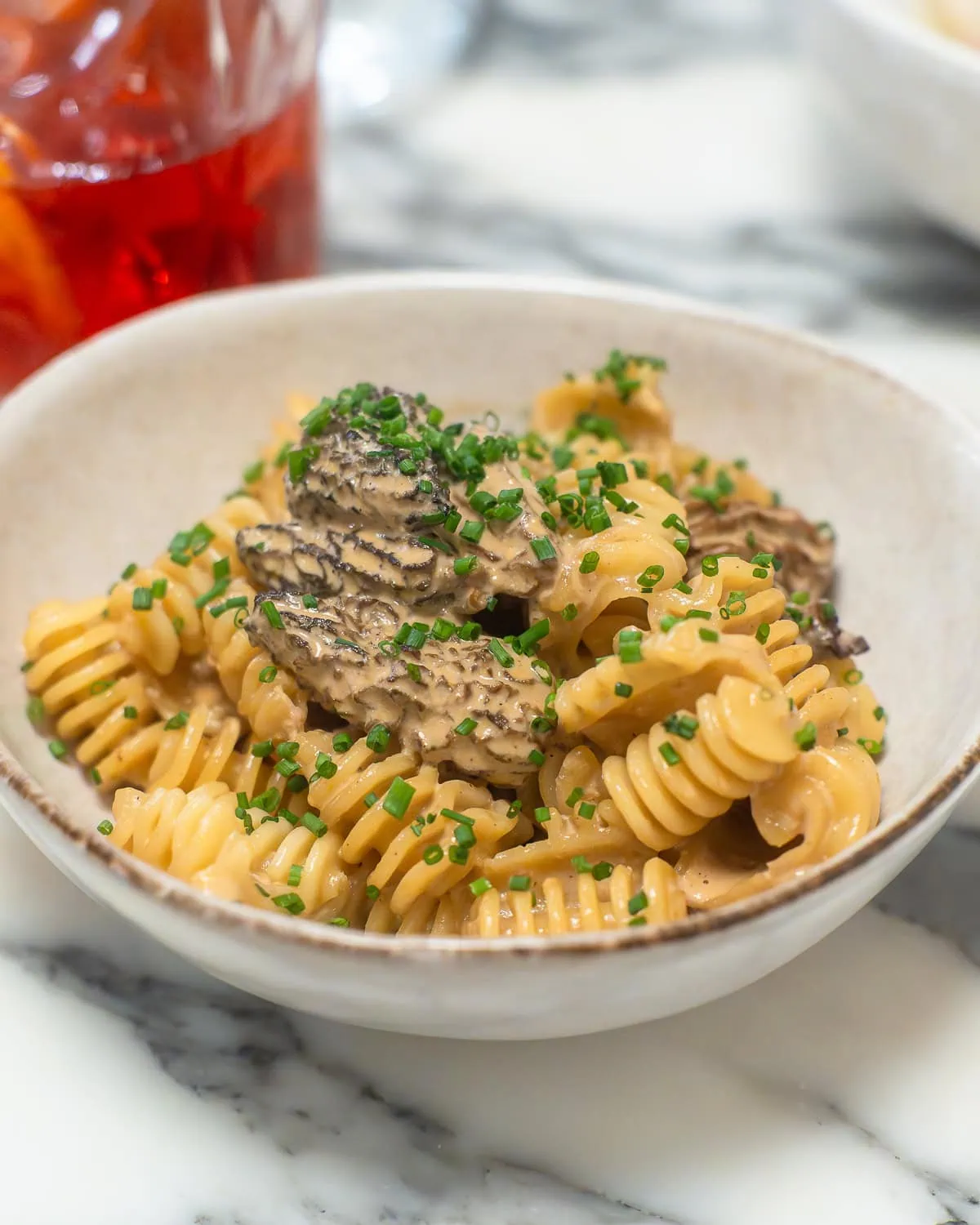 A bowl of mushroom pasta.